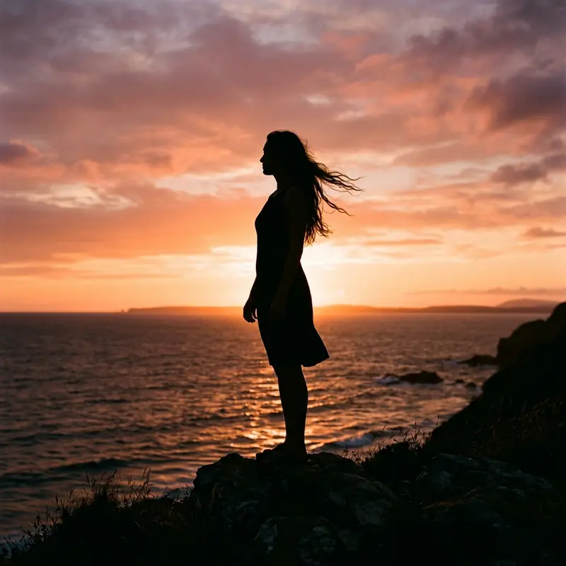 Silhouette WhatsApp DP idea for girls — woman against sunset sky